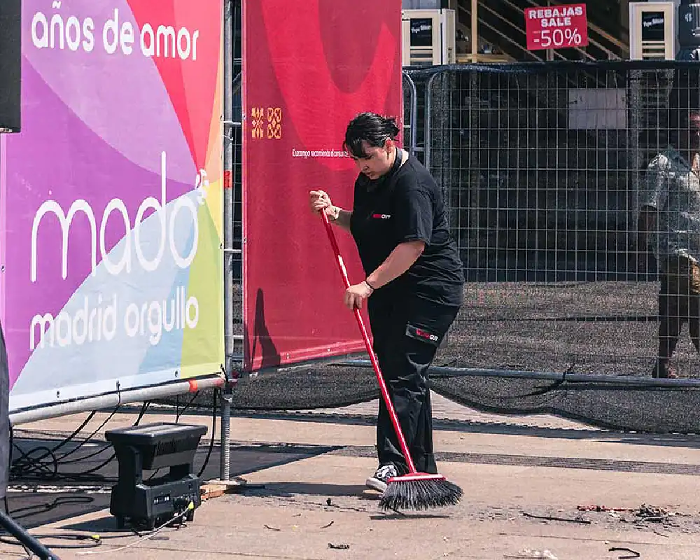 Cleaning personnel sweeping the floor